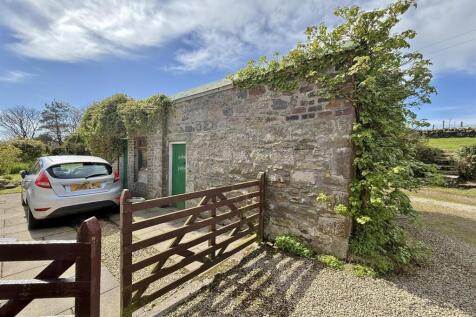 Outbuilding and rear parking