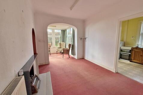 Dining room to kitchen and sun room