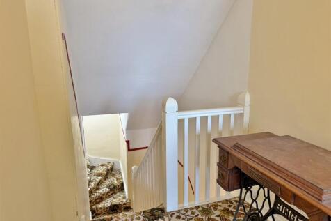 Upper hallway looking down stairs