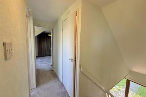 Upper hallway down the stairs