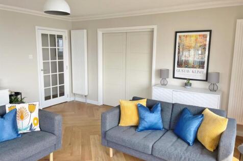 Lounge to hall, pocket doors closed