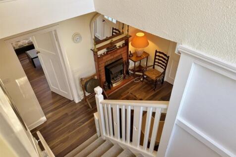 Main stairs down to entrance hallway