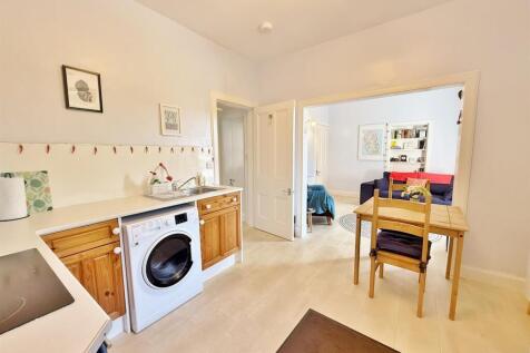 Kitchen area to lounge and hallway