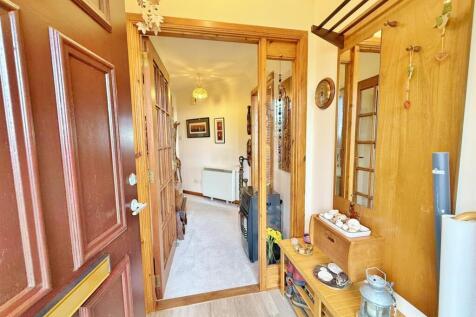 Front entrance vestibule to hallway