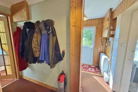 Cloak area to bedroom and front door