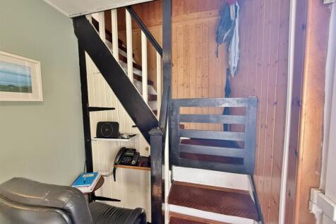 Stairs and study area Entrance hallway
