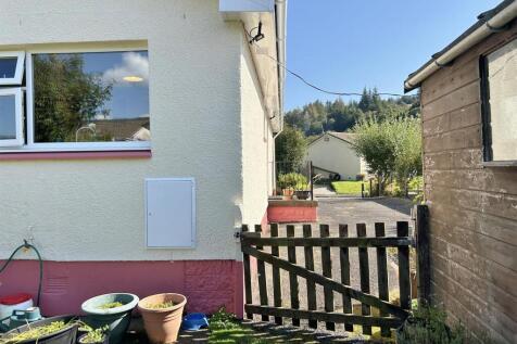 Enclose rear garden