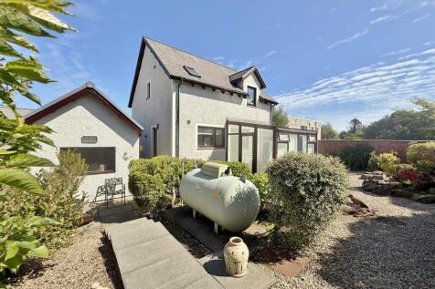 Rear garden and garage