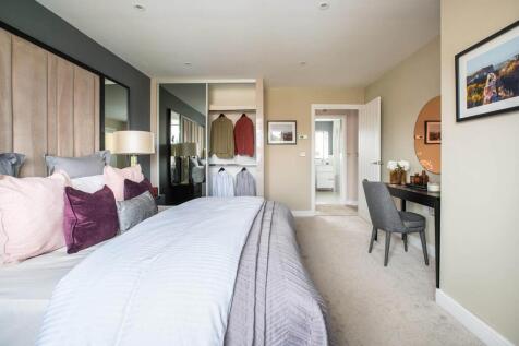 A spacious main bedroom offers a place to relax away from the rest of the home