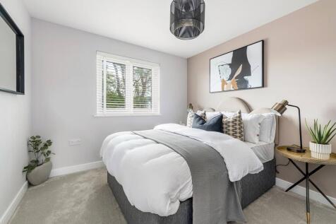 Bedroom two enjoys views of the rear garden