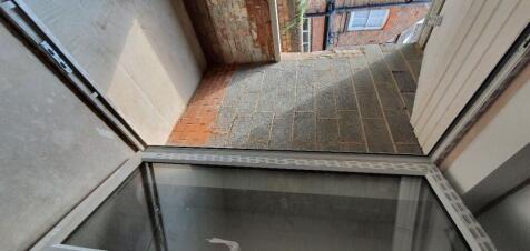 Kitchen/Lounge French Doors leading to Private Cou