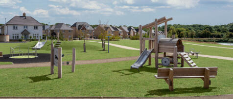 All Saints Gardens play area, with street scene behind