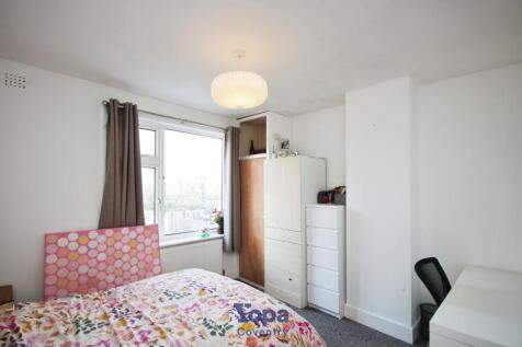 Dd6b1dc2-Bedroom 202.JPG