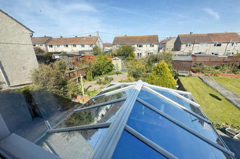 View from Bedroom 2 over the rear garden