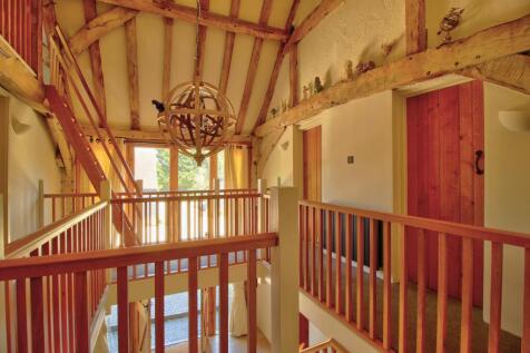 Galleried landing with grand vaulted ceiling