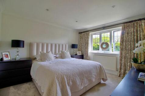 Master Bedroom with fitted wardrobes and en-suite