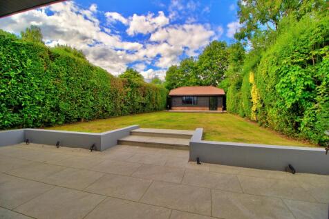 Newly-paved patio with ambient lighting