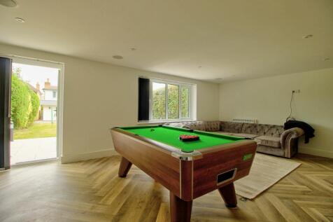 Garden studio with stone patio