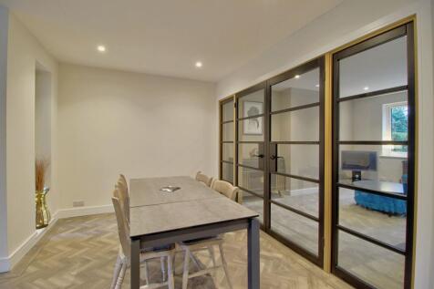 Dining ares with garden window to left