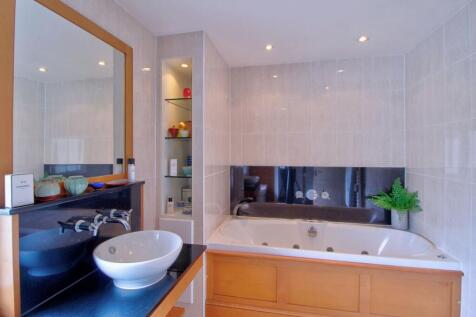 En-suite to Master Bedroom with jacuzzi bath