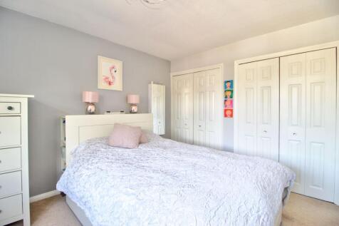 Bedroom One with plenty of storage