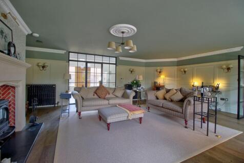 Stove, cast-iron radiator, and under-floor heating
