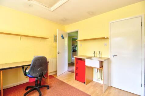 Family Room with large cupboard and water supply