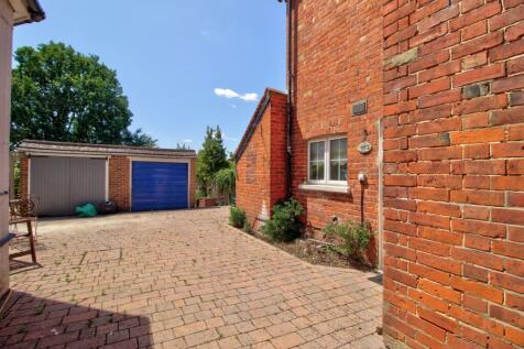 Shared drive to garage (blue door)