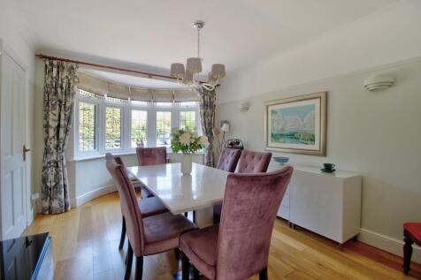Dining Room with elegant bay widow