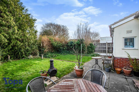 Paved seating area in garden