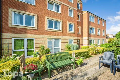 Rear Exterior and paved seating area