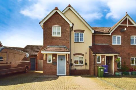 Outside View Of The Property With Driveway Parking
