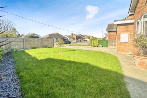Front Driveway View With Garden