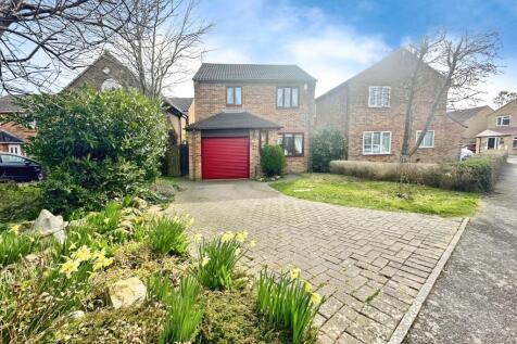 Outside View Of The Property With Driveway Parking