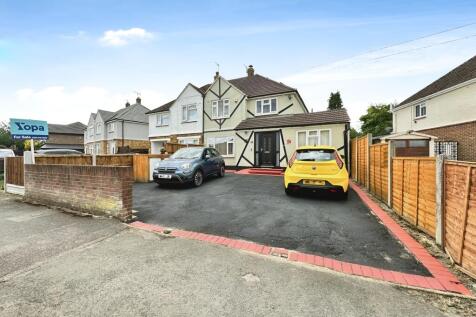 Outside View Of The Property With Driveway Parking
