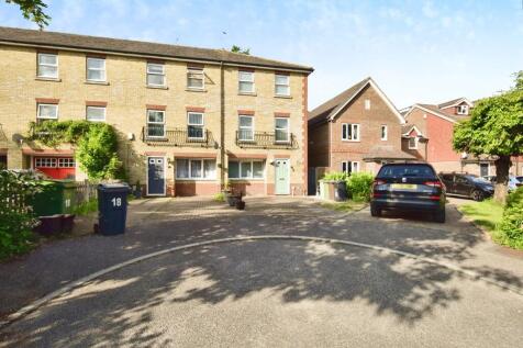 Outside View Of The Property With Driveway Parking