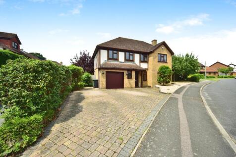 Outside View Of The Property With Driveway Parking