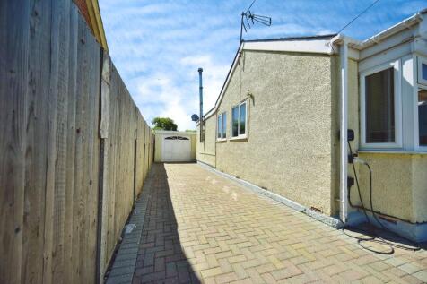 Side Access To The Private Rear Garden With Garage View