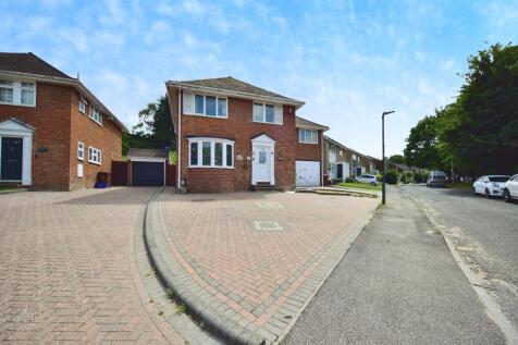 Outside View Of The Property With Driveway Parking