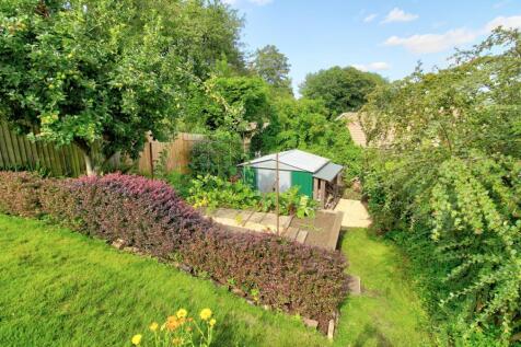 Bottom of garden, shed and woodstore area