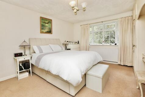 Bedroom one with fitted wardrobes