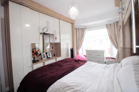Bedroom one with fitted wardrobes