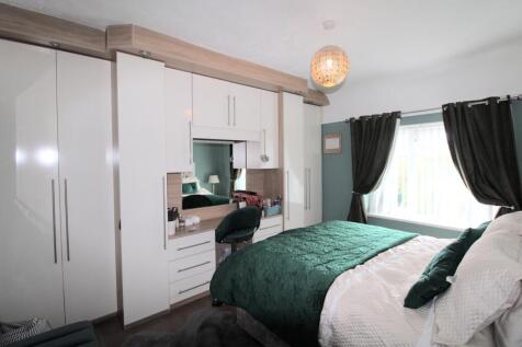 Bedroom two with fitted wardrobes