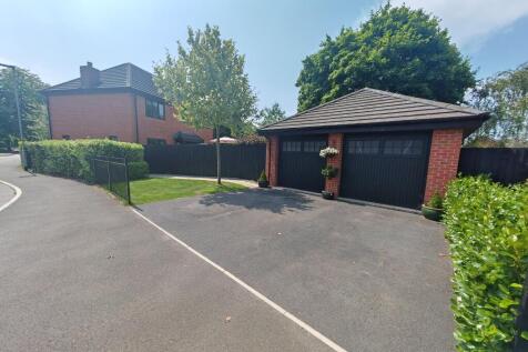 Double garage and parking