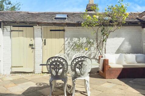 Rear Patio with Outbuildings
