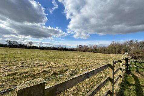 Farmland to rear