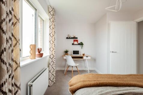 With space for storage or a desk