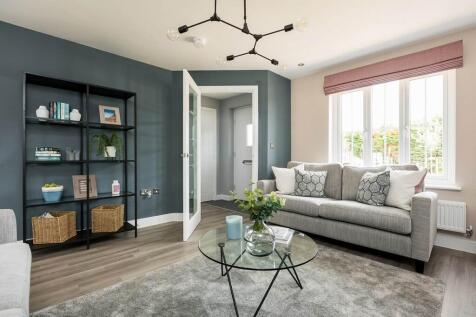 The cosy living room offers the perfect space to relax