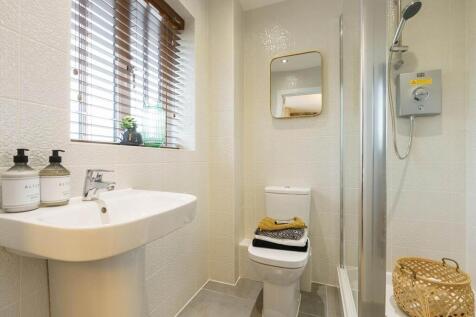 The en suite with high quality fixtures and fittings