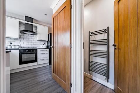 Entrance hall with view of kitchen and W.C..jpg